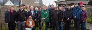 The Potters Garden team plant their tree.